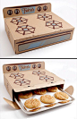 Mod 12 - Cookie Stove Packaging   Delicious cookies packaged inside of a cardboard stove. Brilliant packaging designed by Saturday Mfg for Thelma’s Treats.: 