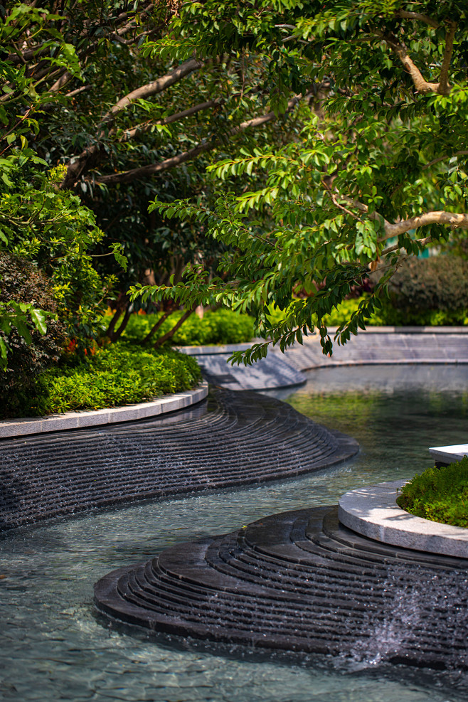 珠海卓越唐家墅 展示区 现代禅意 水景 蜿蜒溪流 树池 跌水 景观设计