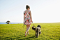 Caucasian woman walking dog in field by Gable Denims on 500px