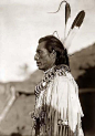 Here for your consideration is an old picture of Crows Heart, an Indian Brave. It was created in 1908 by Edward S. Curtis. The photograph presents the Indian in a half-length portrait, facing left. He is wearing a buckskin shirt, and has two eagle feather