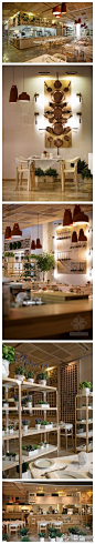 质朴感觉的乌克兰基辅FIORI餐厅设计~~~餐厅店面装饰环保有趣，纯木质的空间装饰简洁，浅色的空间格调加以明快的花草色彩，达到惊人的视觉享受........【更多图片】http://t.cn/zTdqVJ8