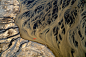 At Glacier's End : Iceland’s glacial rivers are nature’s abstract paintings. It seems obvious that rivers this wild and stunning are protected, yet the harsh reality is that many have been dammed, mainly to provide powe