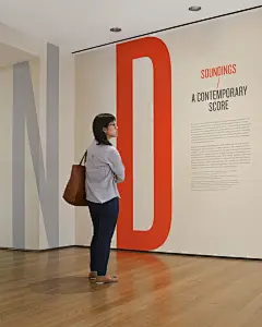 Exhibition graphic panels at MoMA by The Department of Advertising and Graphic Design