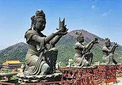 Buddhist statues praising and making offerings to the Tian Tan Buddha in Hong Kong