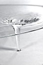 Zaha Hadid: Liquid Glacial Table (2012)    The Liquid Glacial design embeds surface complexity and refraction within a powerful fluid dynamic. The elementary geometry of the flat table top appears transformed from static to fluid by the subtle waves and r