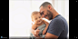Father holding baby son / 500px