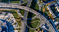 aerial photography, bird's eye view, junction, metropolitan area, intersection, urban area, road, highway, architecture, freeway, landmark, street, urban design, infrastructure, residential area, city, overpass, metropolis, landscape, thoroughfare, suburb