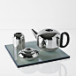 Form Stainless Steel Gift Set by Tom Dixon —  | ECC : Form is a well-proportioned rigorously detailed tea set. It includes a teapot, a milk jug and a sugar bowl. Described as Bauhaus, Space Age or Art Deco we believe this crisp, clean reflective stainless