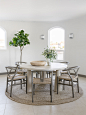 Inspiration for a large contemporary beige floor breakfast nook remodel in Los Angeles with white walls