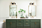 Medium sized contemporary ensuite bathroom in Atlanta with shaker cabinets, green cabinets, a freestanding bath, a two-piece toilet, porcelain tiles, porcelain flooring, a submerged sink, engineered stone worktops, a hinged door, a wall niche, double sink