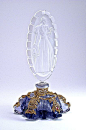 1920s Czechoslovakian perfume bottle, amethyst crystal, clear/frost stopper (loose fit), enameled and jeweled gilt metal filigree. Made in Czechoslovakia in oval, in circle, and on metal. 7 1/4 in.