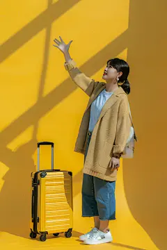 拖着行李箱去远行