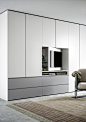 Gola, Designer Wardrobe with Mounted TV Panel | Novamobili : Gola is Novamobili's wardrobe with mounted TV panel that fits perfectly in both modern and classic interiors. Find your nearest dealer.