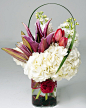 white hydrangea with lilies, tulips and stock