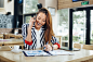 Happy businesswoman on the phone in a cafe by Milenko Đilas on 500px