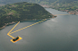 The Floating Piers - In the morning of June 16, unfurling of 1000,000 square meters of shimmering yellow fabric on the piers and pedestrian streets in Sulzano and Peschiera Maraglio is nearly completed (11)