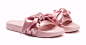 Bow Women's Slide Sandals, buy it @ www.puma.com : Influenced by the luxurious Parisian days of Marie-Antoinette, the Bow Slide by FENTY takes the classic soccer slide up a bunch of notches. A beautiful satin bow adorns the slide strap, with a satin foam 