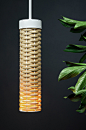 LIER SUN : Pendant lamp "Lier sun" are based on a simple tube shape. Due to the interlacing of rattan, an unusual texture is created, through which the light hardly penetrates the sides, like small rays of the sun.