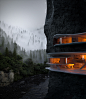 A concept of a resort which is carved into a rocky mountain.