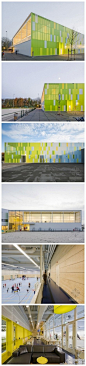 荷兰彩色运动馆，设计的新大楼像三明治一样，被夹在了两个原有建筑中间，该位置原来是为自行车提供停车位的。在建筑外墙涂上鲜艳的颜色，为课后来运动的学生营造了一个温馨的氛围。{详细内容}http://t.cn/zTEXwWm