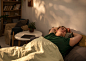High angle plus-sized man laying in bed