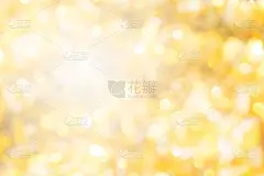 抽象模糊的金色和黄色色彩渐变背景与散景灯光效果为圣诞快乐和新年快乐节日设计和元素概念