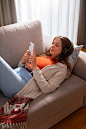Free photo high angle young woman spending time at home