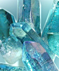 AQUA AURA QUARTZ in a semi-secret process which is part alchemy and part science, the two unique substances of quartz crystal and pure gold are commingled in a permanent way, creating an immensely powerful protection combination which fuses the White, Blu