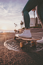 woman riding skateboard during daytime