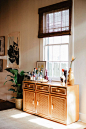 bamboo credenza used as a bar