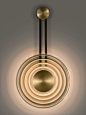 Solar wall light from Chelsom in Black Bronze with English Brass accents and smoke glass