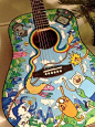 Adventure Time Acoustic Guitar. I would want to learn to play just because this is AMAZING!!!