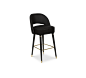 COLLINS | BAR CHAIR : Collins is a crescent open back bar chair designed with sleek mid-century modern lines. It has glamorous glossy black legs, accented by polished brass details, especially in the bottom legs, and is upholstered in velvet. A luxurious 