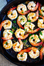 Garlic shrimp with butter, lemon juice and cayenne pepper.