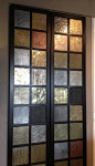 Doors in our studio with inset cast metallic panels