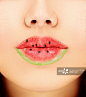 Woman's mouths with watermelon.Concept- fruity lip gloss