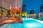 曼谷IBIS STYLES 酒店 by VVdesine :   VVdesine ：酒店景观包含两个部分，入口红色坐凳广场和屋顶泳池酒吧。景观广场充满了红色斜面坐凳。 VVdesine ：The hotel landscape consists of two parts, entrance red stool square and rooftop swimming pool bar. The landscape squar...