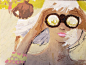 blond girl in yellow with binoculars at the beach illustration by bernard (bernie) fuchs