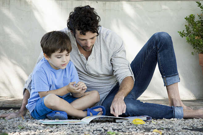 Father and son readi...