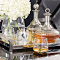 Keep the guests happy and the drinks flowing. Decanters like this are a great way to store and present your drinks at a party and really add to the luxury feel of the room.