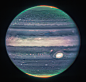 Jupiter dominates the black background of space. The planet is striated with swirling horizontal stripes of neon turquoise, periwinkle, light pink, and cream. The stripes interact and mix at their edges like cream in coffee. Along both of the poles, the p