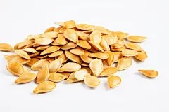 炒瓜子干炒南瓜瓜子干果年货摄影图