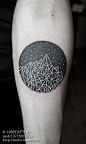 geometric mountain with starry sky, blackwork circle white lines on black field tattoo