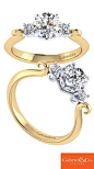 A gorgeous detailed Gabriel & Co. 14k yellow and white gold diamond three stone engagement ring.