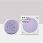A circular purple facial soap bar next to a box for The Right Facial Soap Collagen 包装