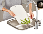 Joseph Joseph - Chop & Drain : A multi-functional chopping board that allows you to chop and slice food, then rinse it with the integrated colander.