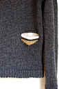 Pocket detail on the Primoeza sweater