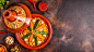 Vegetable tagine with almond and chickpea couscous Vegetable tagine with almond and chickpea couscous, top view. tajine stock pictures, royalty-free photos & images