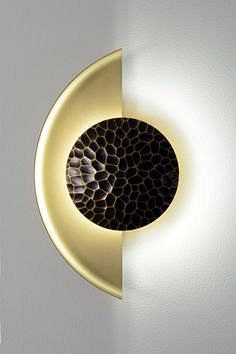 The Helix sconce is ...