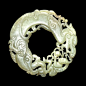 Archaistic jade ring / pendant. Ming dynasty, 15th-16th century AD, China. In the shape of a dragon and a boy.